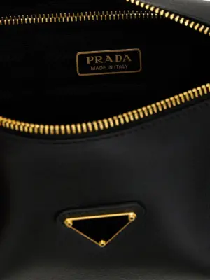 Logo shoulder bag 100% leather PRADA Black