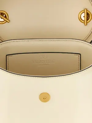 Valentino Garavani 'Vain' mini crossbody bag Fall Winter 2025/2026 VALENTINO GARAVANI White